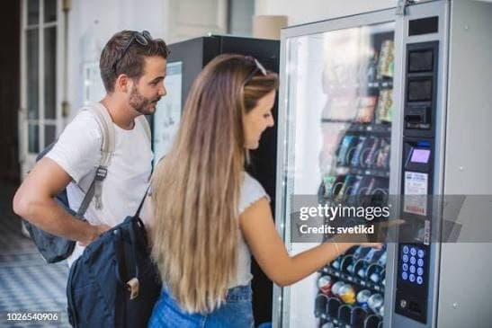 People using a Vending Machine