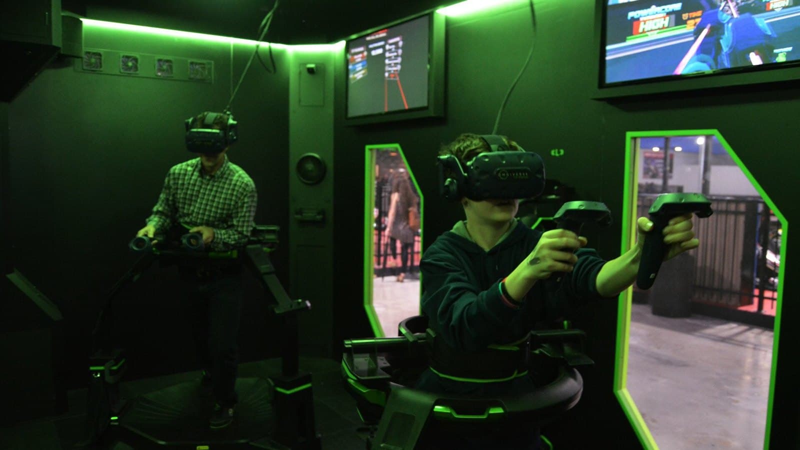 Players on omnidirectional VR treadmills in an arcade bay